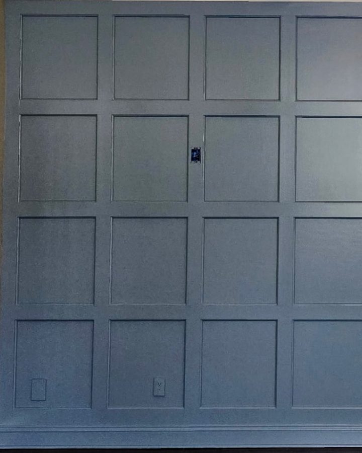 Slate blue custom wall paneling with decorative molding and crown trim in a New Canaan, CT home
